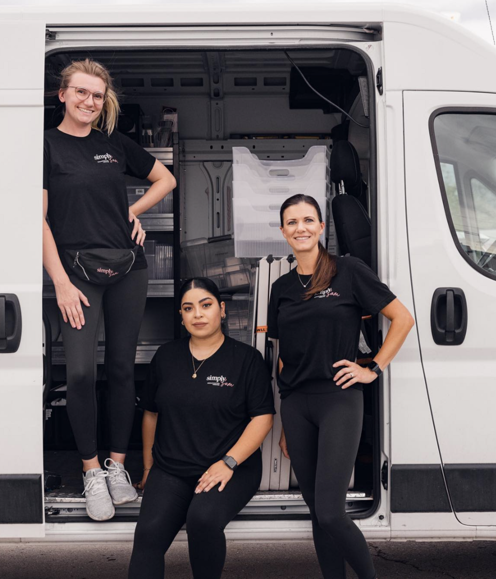 The Simply Sam team standing in front of our moving van