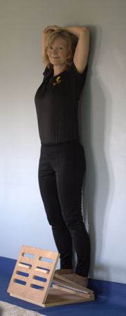 Man doing PainSweep exercises in his living room.