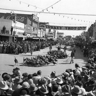 A Scene From The Cuero Turkey Trot Parade At The Corner Of Main And Esplanade Looking East.