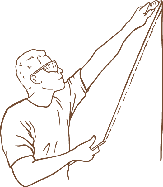 Illustration of person installing drywall wearing safety glasses