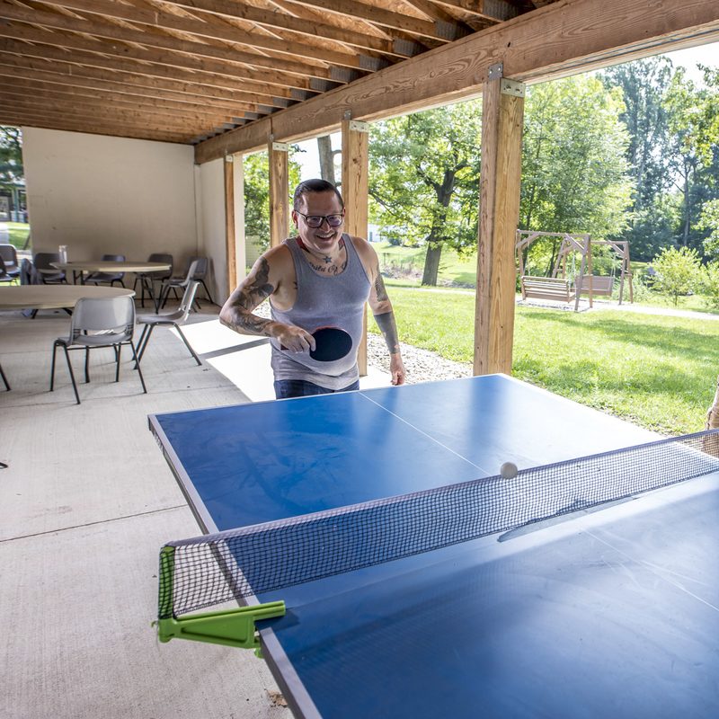 Mockingbird Hill residents playing ping pong