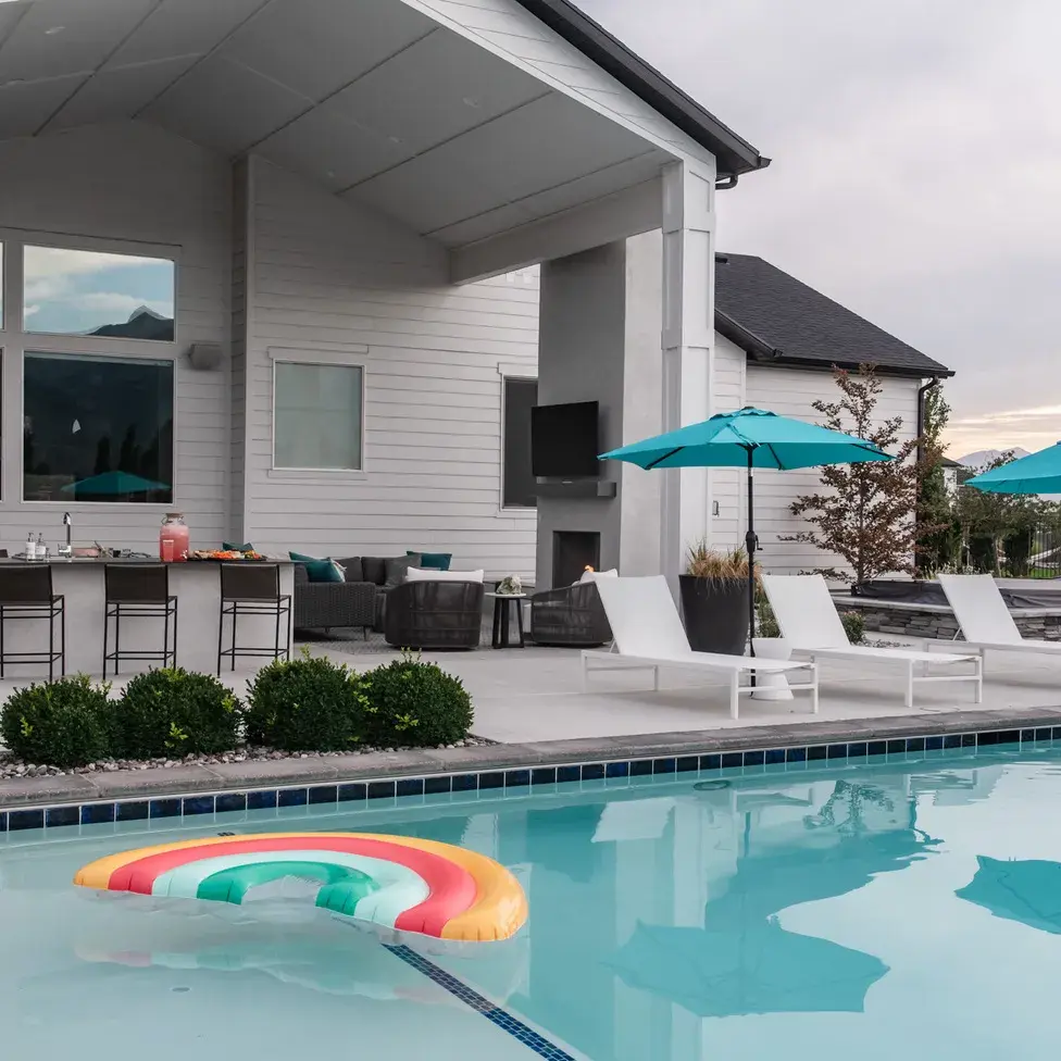 outdoor pool area and bbq area designed by lund haus studio