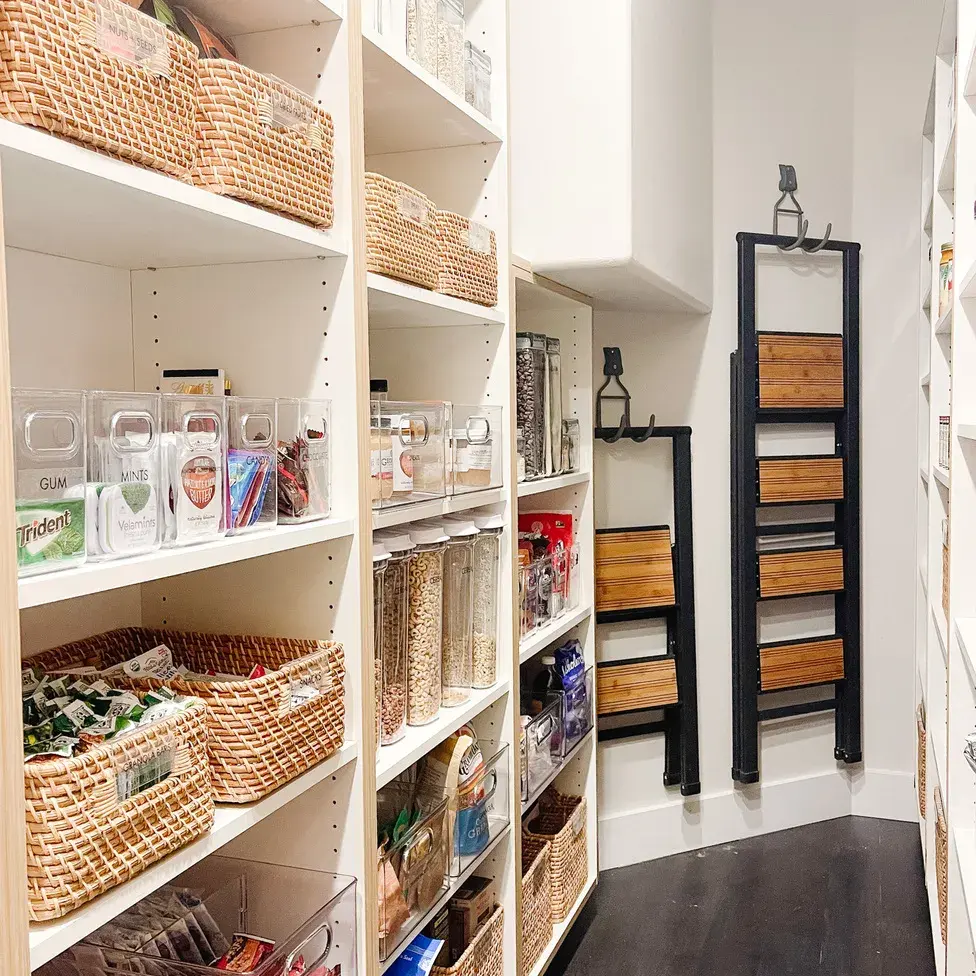 organixed walk-in pantry with rattan baskets and acrylic 